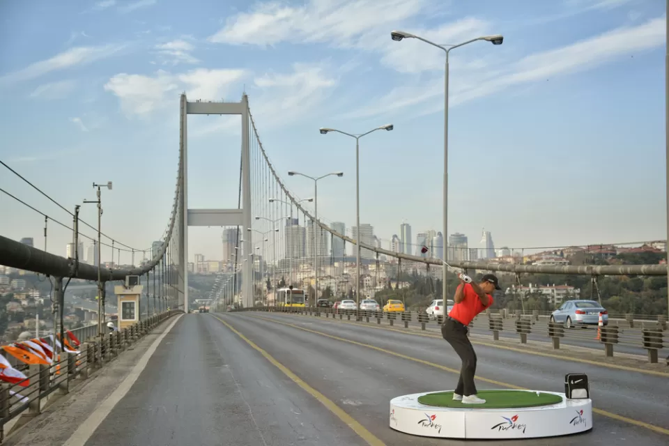 Tiger Woods on a bridge
